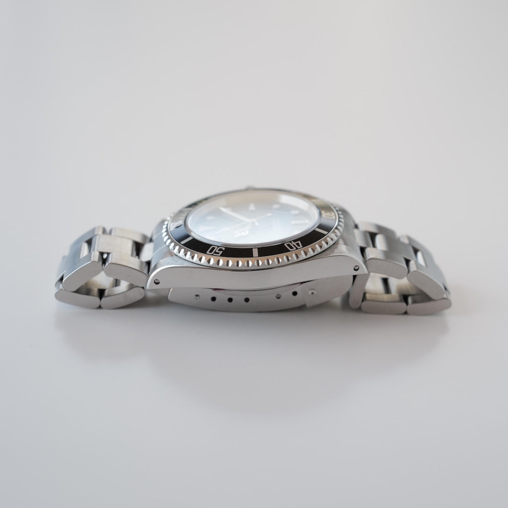 ロレックス/サブマリーナー14060/スイスオンリー/裏蓋シールあり/保証書付き/ROLEX SUBMARINER Ref.14060 "SWISS ONLY" 1998y with Paper