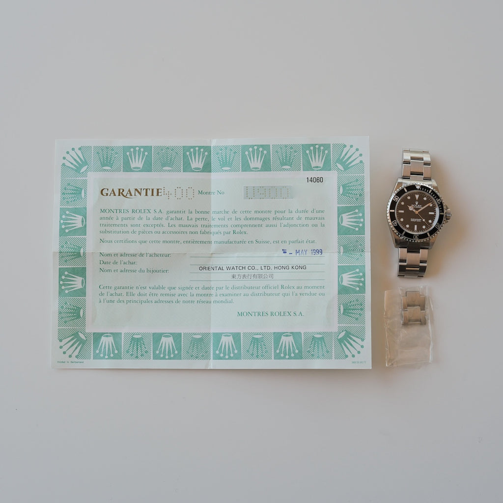 ロレックス/サブマリーナー14060/スイスオンリー/裏蓋シールあり/保証書付き/ROLEX SUBMARINER Ref.14060 "SWISS ONLY" 1998y with Paper