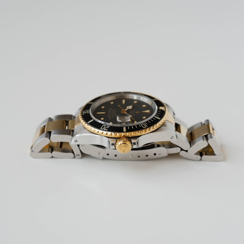 ロレックス/サブマリーナーデイト16803/R番/フジツボダイヤル/18Kイエローゴールド/ROLEX SUBMARINER DATE REF.16803 "Black Nipple Dial" 18KYG 1988y